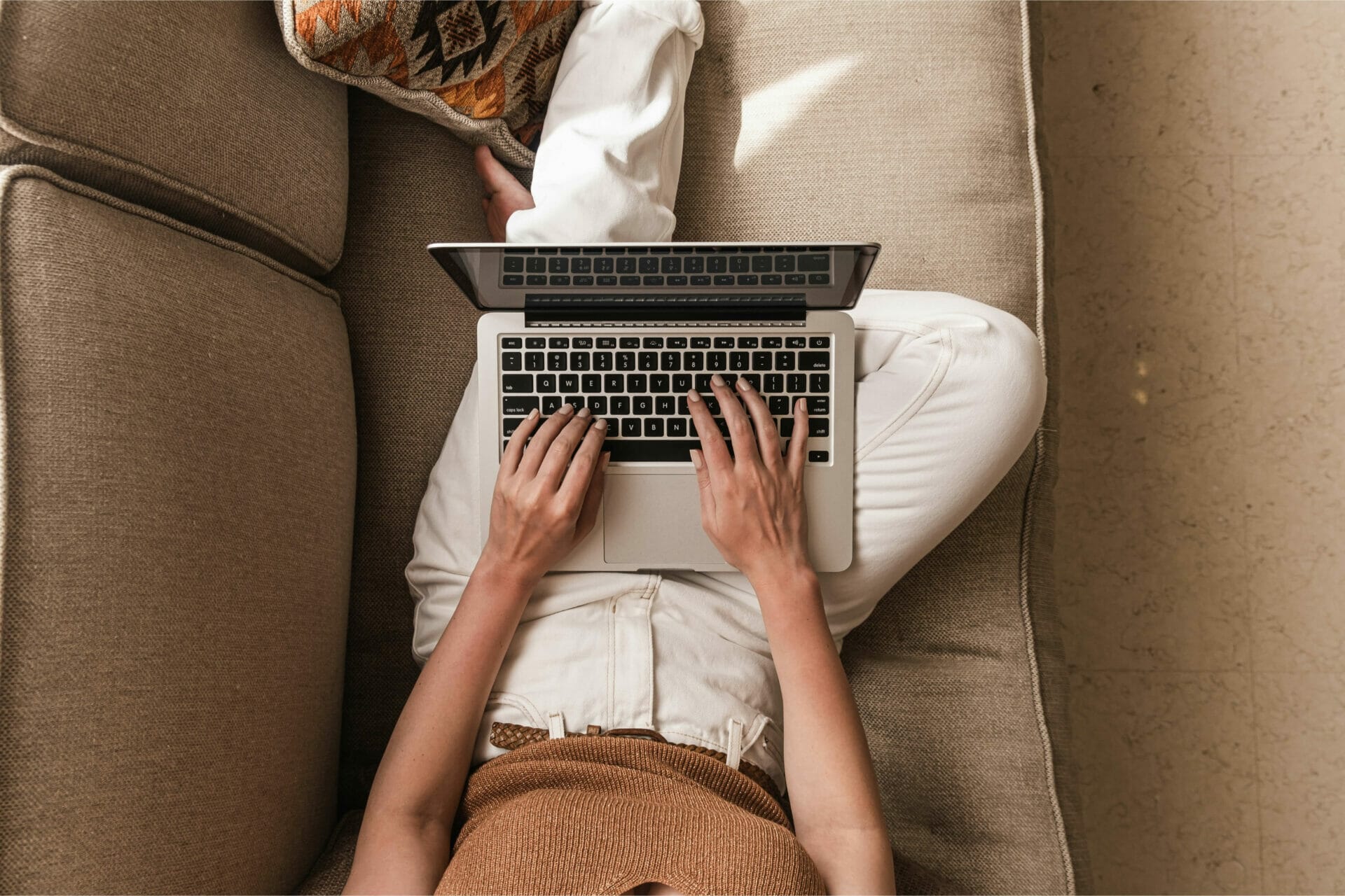 Woman working in laptop at living room